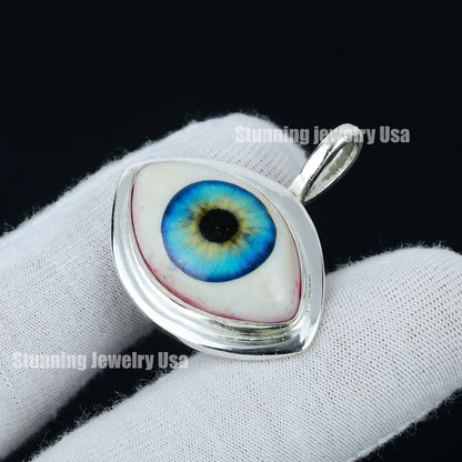 Ice Blue Human Eye Gemstone Pendant