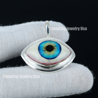 Ice Blue Human Eye Gemstone Pendant