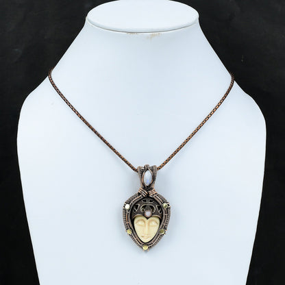 White Carved Bone Face Gemstone Pendant