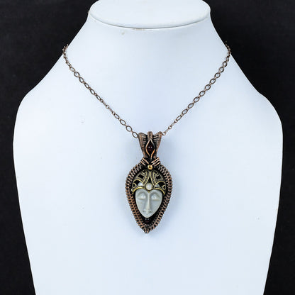 Grey Carved Bone Face Gemstone Pendant