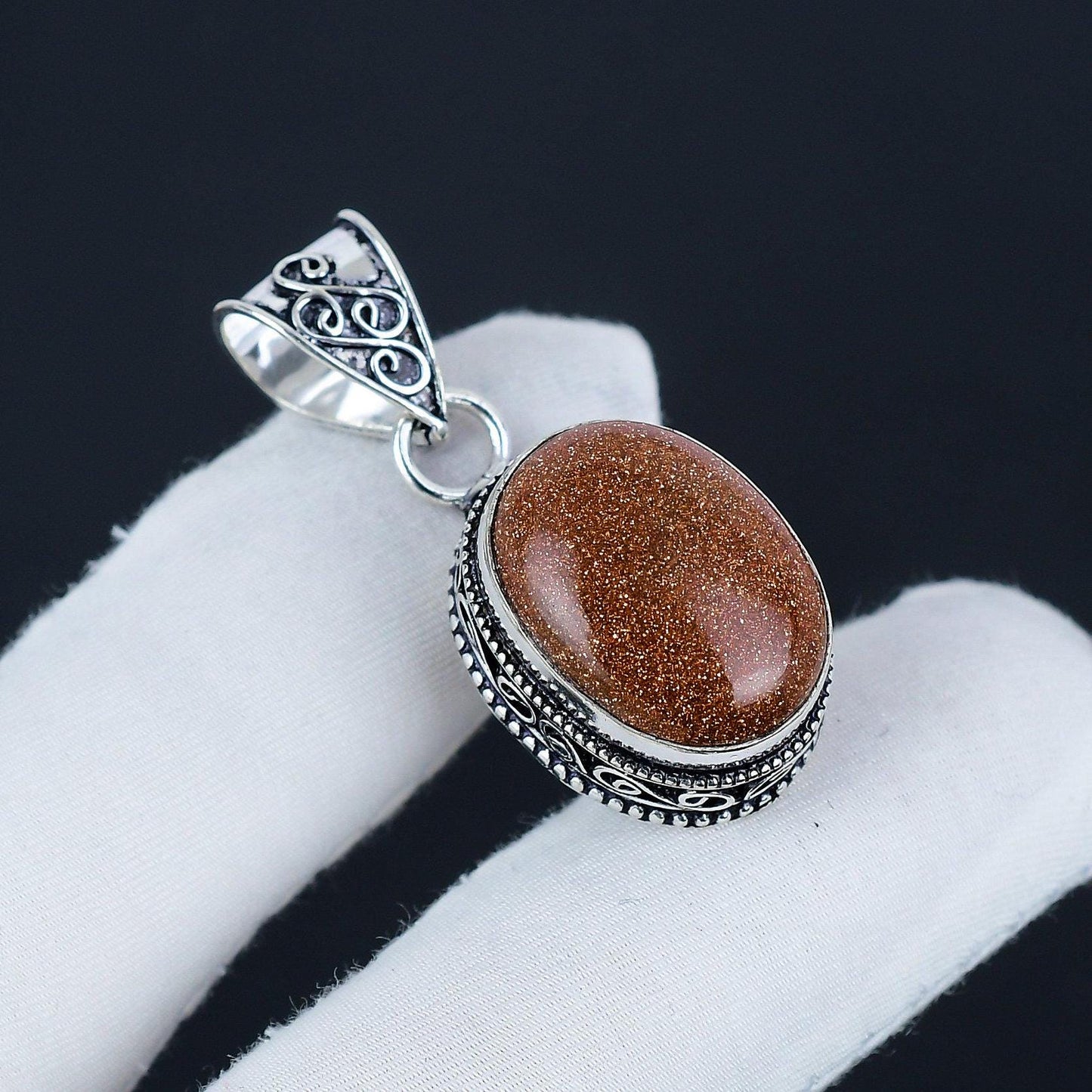 Orange Sunstone Silver Pendant
