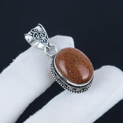 Orange Sunstone Silver Pendant