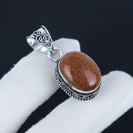 Orange Sunstone Silver Pendant