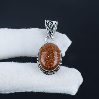 Orange Sunstone Silver Pendant